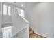 Upstairs hallway with carpeted stairs and neutral-colored walls at 4216 N 27Th St # 106, Phoenix, AZ 85016