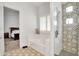 Spa-like bathroom with a soaking tub and patterned tile at 4216 N 27Th St # 106, Phoenix, AZ 85016