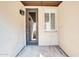 Small balcony with door access and window shutters at 4216 N 27Th St # 106, Phoenix, AZ 85016