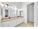 Double vanity bathroom with granite countertops and updated fixtures at 4216 N 27Th St # 106, Phoenix, AZ 85016