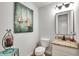 Stylish bathroom with granite vanity and decorative mirror at 4216 N 27Th St # 106, Phoenix, AZ 85016