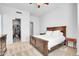 Large bedroom with a walk-in closet and wood furniture at 4216 N 27Th St # 106, Phoenix, AZ 85016