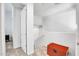 Upstairs hallway with carpet flooring and storage chest at 4216 N 27Th St # 106, Phoenix, AZ 85016