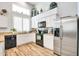 Modern kitchen with stainless steel appliances and granite countertops at 4216 N 27Th St # 106, Phoenix, AZ 85016