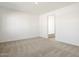 Simple bedroom with carpet flooring and access to a bathroom at 3530 E Alexander Dr, San Tan Valley, AZ 85143