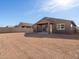Large backyard with a covered patio and plenty of space for entertaining at 3530 E Alexander Dr, San Tan Valley, AZ 85143