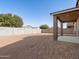 Spacious backyard with covered patio and plenty of room for outdoor activities at 3530 E Alexander Dr, San Tan Valley, AZ 85143
