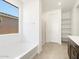 Modern bathroom with soaking tub, walk-in shower, and dual vanities at 3530 E Alexander Dr, San Tan Valley, AZ 85143