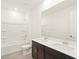 Double vanity bathroom with a large mirror and tub at 3530 E Alexander Dr, San Tan Valley, AZ 85143
