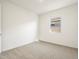 Simple bedroom with neutral walls and carpet at 3530 E Alexander Dr, San Tan Valley, AZ 85143
