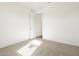 Spacious bedroom with neutral wall colors and carpeted flooring at 3530 E Alexander Dr, San Tan Valley, AZ 85143