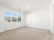 Bright and airy bedroom with large windows and neutral carpeting at 3530 E Alexander Dr, San Tan Valley, AZ 85143