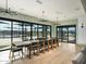 Community dining area with large table and chairs, overlooking pool area at 3530 E Alexander Dr, San Tan Valley, AZ 85143