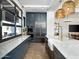 Modern community kitchen with marble island and stainless steel appliances at 3530 E Alexander Dr, San Tan Valley, AZ 85143