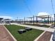 Outdoor games, picnic tables, and string lights create a fun atmosphere at 3530 E Alexander Dr, San Tan Valley, AZ 85143