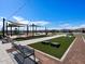 Outdoor lawn games, picnic tables, and string lights create a fun atmosphere at 3530 E Alexander Dr, San Tan Valley, AZ 85143