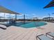 Inviting pool and splash pad with plenty of lounge chairs at 3530 E Alexander Dr, San Tan Valley, AZ 85143