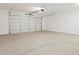 Spacious garage with overhead door and concrete floor at 3530 E Alexander Dr, San Tan Valley, AZ 85143