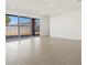 Spacious living room with large sliding glass doors at 3530 E Alexander Dr, San Tan Valley, AZ 85143