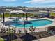 Community pool area with water features and ample seating at 3530 E Alexander Dr, San Tan Valley, AZ 85143