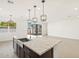Kitchen with large island and granite countertops at 3530 E Alexander Dr, San Tan Valley, AZ 85143