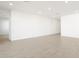 Spacious living room with light wood-look floors at 3530 E Alexander Dr, San Tan Valley, AZ 85143