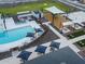 Resort-style pool with lounge chairs and shade structures at 3530 E Alexander Dr, San Tan Valley, AZ 85143