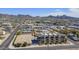 Aerial view of townhouses with mountain views and a city in the background at 507 E Mountain View Rd, Phoenix, AZ 85020