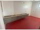 Bathroom with floating vanity and red epoxy flooring at 507 E Mountain View Rd, Phoenix, AZ 85020