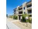 Three-story building with multiple units, balconies, and gated entry at 507 E Mountain View Rd, Phoenix, AZ 85020