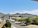 View of mountain range and neighborhood from a distance at 507 E Mountain View Rd, Phoenix, AZ 85020