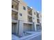 Modern townhome building with attached garages and mountain views at 507 E Mountain View Rd, Phoenix, AZ 85020