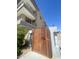 Wooden gate leading to modern townhome community at 507 E Mountain View Rd, Phoenix, AZ 85020