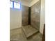Modern bathroom featuring a walk-in shower with grey tile at 507 E Mountain View Rd, Phoenix, AZ 85020