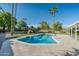 Inviting kidney-shaped pool with a spacious deck and play area at 10808 N 43Rd St, Phoenix, AZ 85028