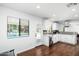 Updated kitchen featuring white cabinets and a view of the backyard at 10808 N 43Rd St, Phoenix, AZ 85028