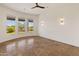 Bright bedroom with tile floors and large windows at 41253 N Whistling Strait Ct, Anthem, AZ 85086