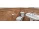 Elegant bathroom with tile flooring and pedestal sink at 41253 N Whistling Strait Ct, Anthem, AZ 85086