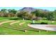 Scenic community park with amphitheater, playground, and mountain views at 41253 N Whistling Strait Ct, Anthem, AZ 85086