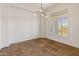 Bright dining room with large windows and tile floors at 41253 N Whistling Strait Ct, Anthem, AZ 85086