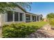 Artificial turf backyard with covered patio at 41253 N Whistling Strait Ct, Anthem, AZ 85086