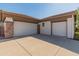 Two-car garage with stone accents and extra parking at 41253 N Whistling Strait Ct, Anthem, AZ 85086