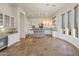 Elegant kitchen with white cabinets and granite island at 41253 N Whistling Strait Ct, Anthem, AZ 85086