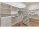 Spacious walk-in closet with ample shelving and hanging space at 41253 N Whistling Strait Ct, Anthem, AZ 85086