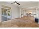 Open concept kitchen with island, stainless steel appliances, and granite countertops at 41253 N Whistling Strait Ct, Anthem, AZ 85086