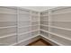 Bright walk-in pantry with ample shelving at 41253 N Whistling Strait Ct, Anthem, AZ 85086