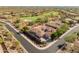 Aerial view of house and neighborhood, showing location near golf course at 41253 N Whistling Strait Ct, Anthem, AZ 85086