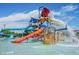 Community water park with slides and a water play area at 41253 N Whistling Strait Ct, Anthem, AZ 85086