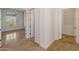 Bright hallway with tile floors and access to rooms at 41253 N Whistling Strait Ct, Anthem, AZ 85086