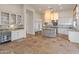 Gourmet kitchen boasts white cabinetry, granite counters, and high-end appliances at 41253 N Whistling Strait Ct, Anthem, AZ 85086